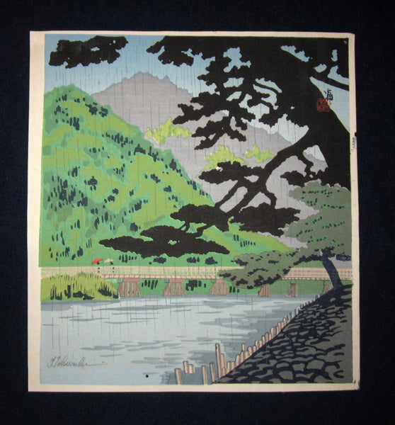 This is a very a beautiful and special ORIGINAL Japanese woodblock print “River Bridge” signed by the famous Showa Shin Hanga woodblock print master Tomikichiro Tokuriki (1902-1999) made in 1950s. 